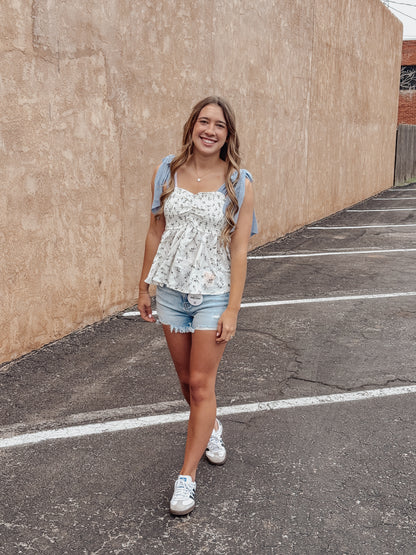 High Rise Distressed Washed Step Side Hem Shorts