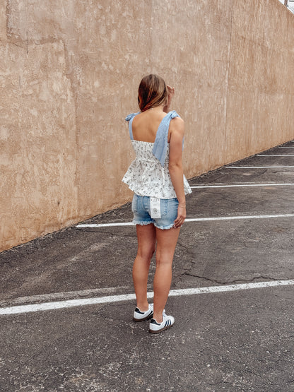 High Rise Distressed Washed Step Side Hem Shorts