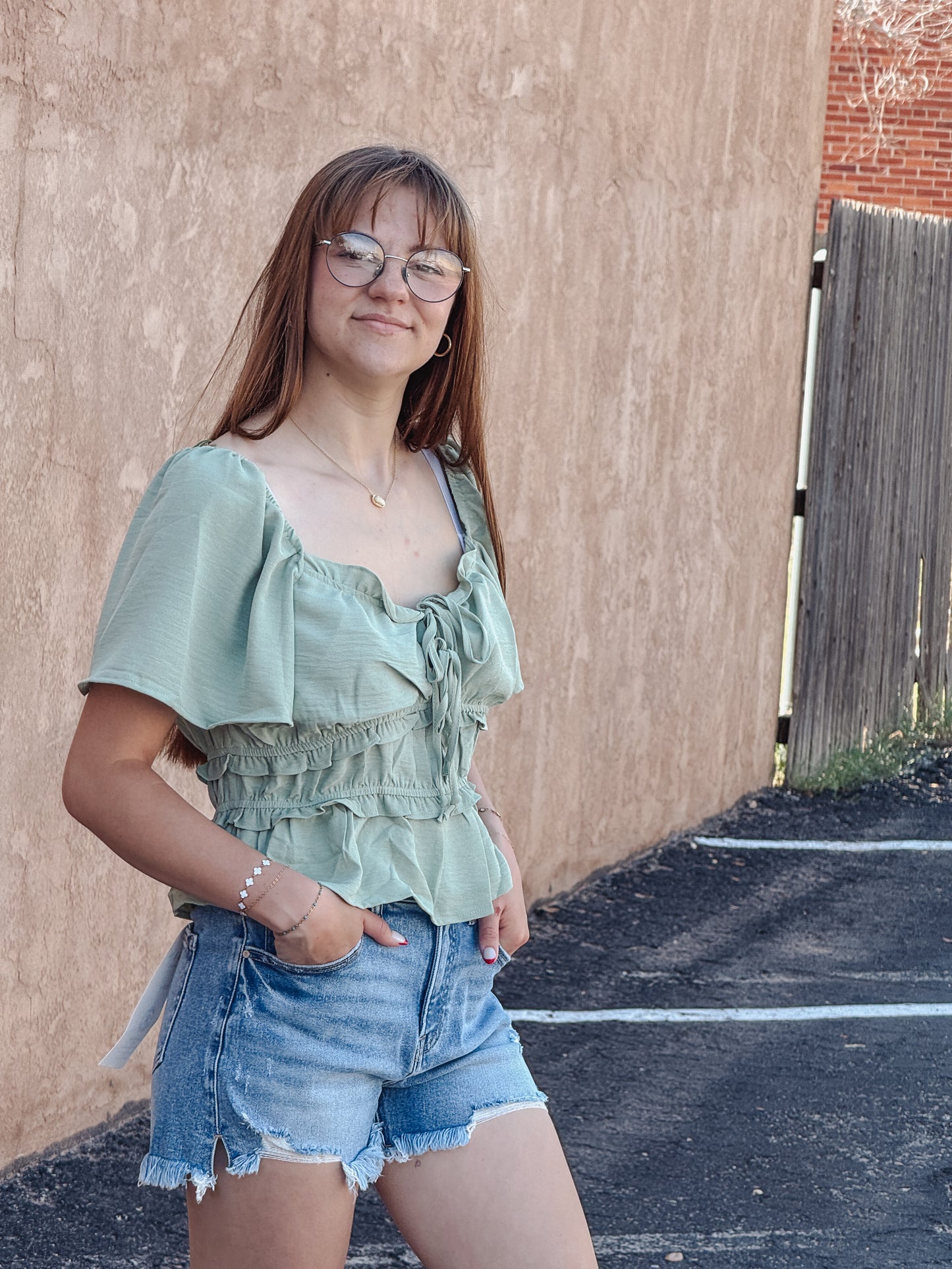 The Sage Blossom Peplum Tie Front Top